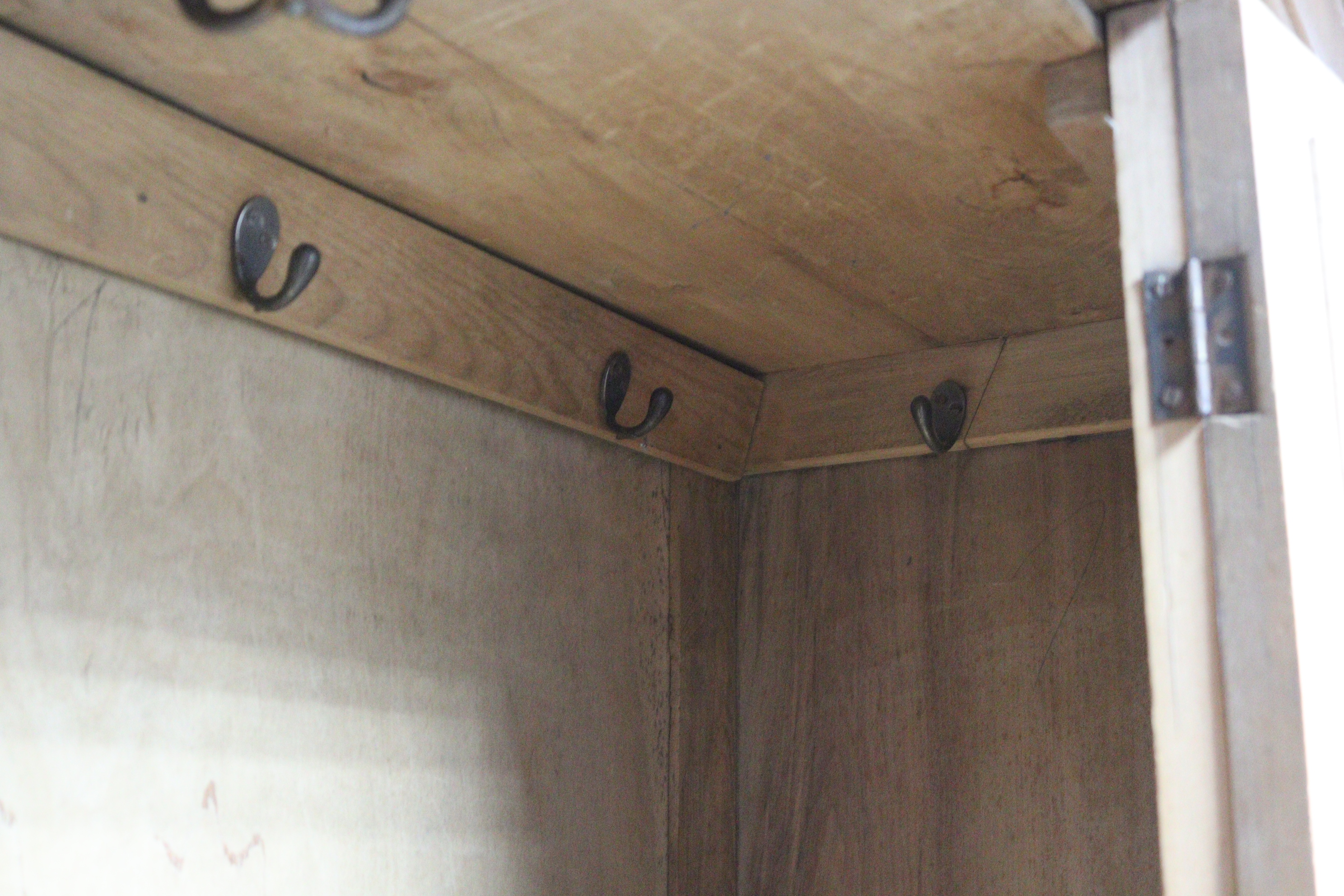 A late Victorian bleached walnut wardrobe with moulded cornice, enclosed by a rectangular bevelled - Image 7 of 9