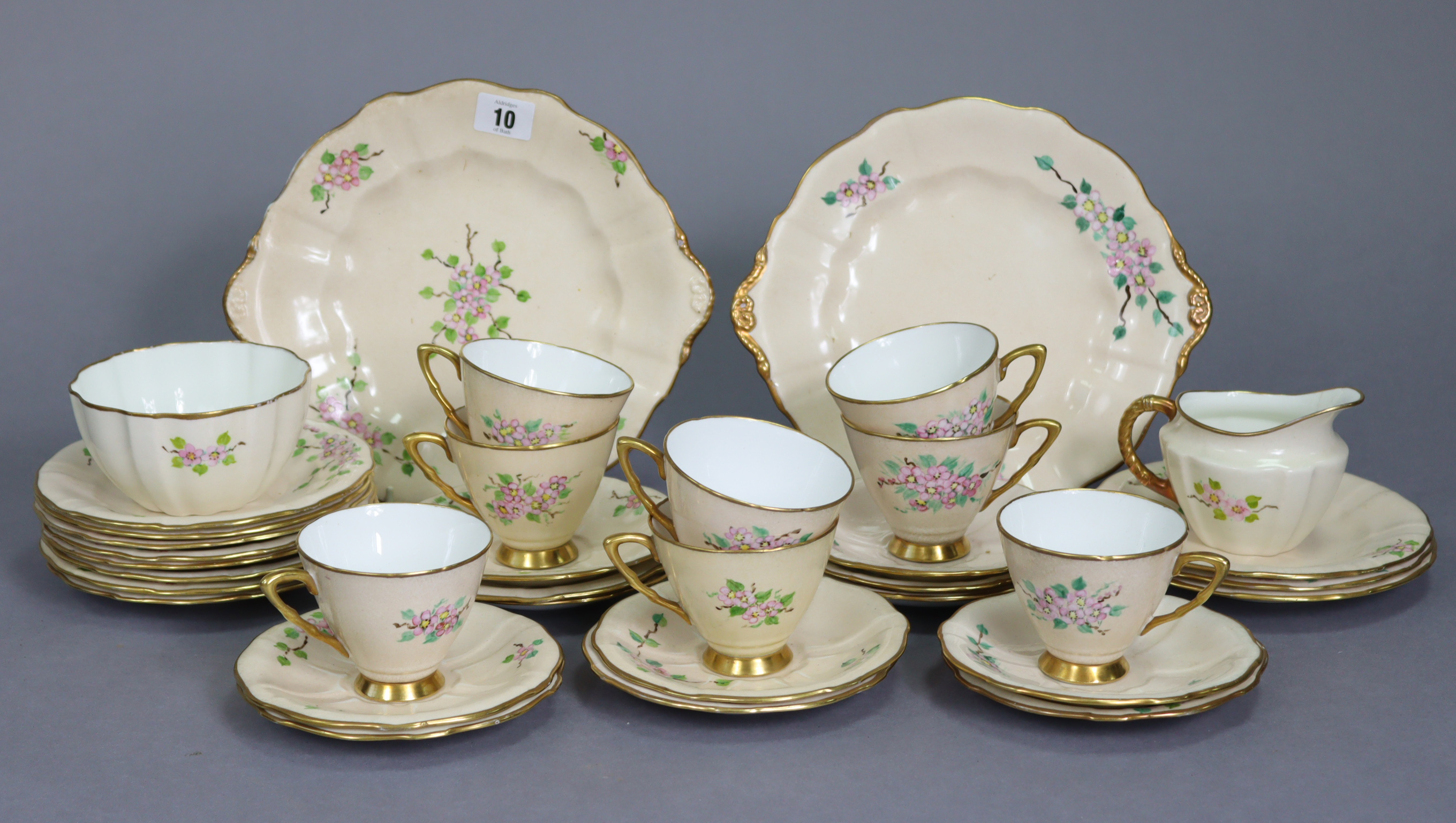 A Royal Crown Derby floral decorated thirty-five piece extensive tea service.