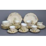 A Royal Crown Derby floral decorated thirty-five piece extensive tea service.
