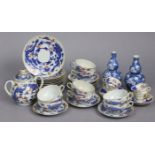 A Chinese eggshell porcelain twenty-eight piece part tea service with dragon decoration; a pair of