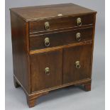 A reproduction mahogany chest commode with a hinged lift-top, mock-drawer front above cupboard