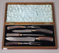 A set of five late 19th/early 20th century antler-handled carvers by Lee & Wigfull of Sheffield,