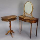 A reproduction mahogany serpentine-front small side table, fitted two frieze drawers & on fluted