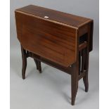 A late 19th/early 20th century inlaid-mahogany Sutherland table with canted corners to the