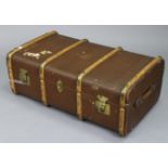 A mid-20th century fibre-covered ribbed travelling trunk fitted with a removable tray enclosed by