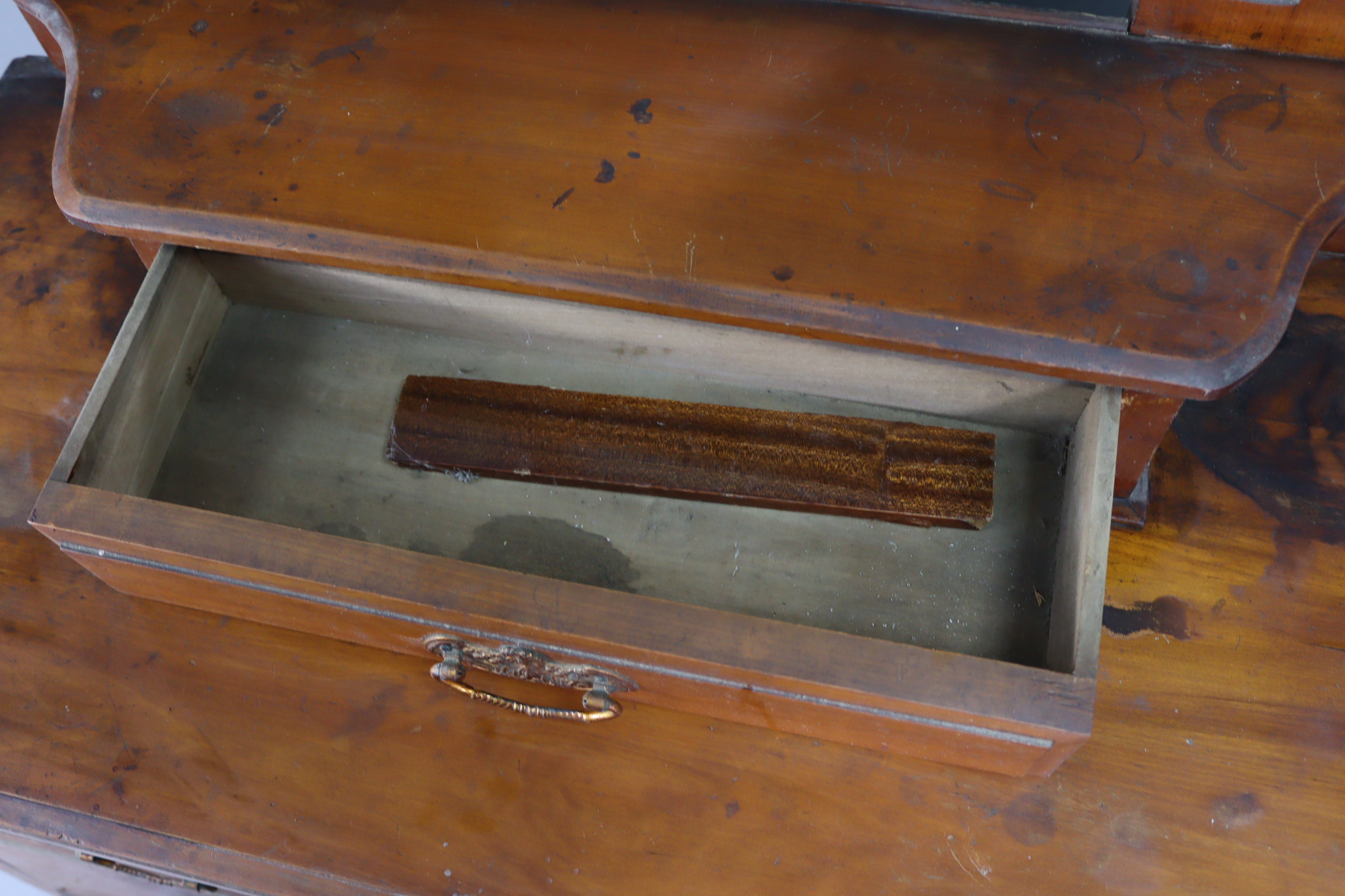 A late Victorian walnut dressing chest with rectangular swing mirror to the stage back, fitted two - Image 4 of 5