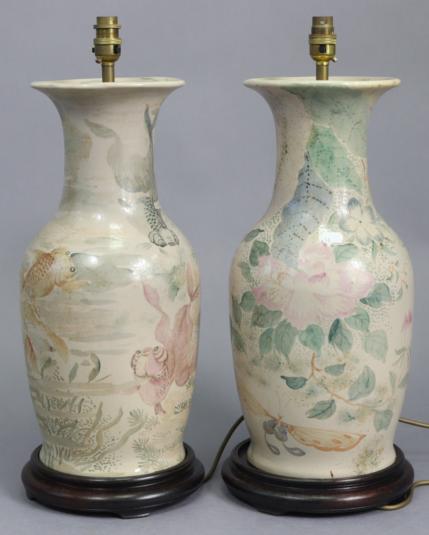 A pair of large ceramic table lamps with painted Siamese fighting fish decoration (lacking