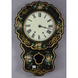 A Victorian japanned papier mache wall clock with striking movement, having black Roman numerals to