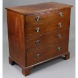 A GEORGIAN MAHOGANY SMALL CHEST fitted four long graduated drawers with brass swing handles, & on