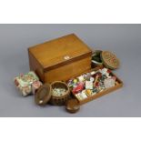 A walnut needlework box with a hinged lift-lid, 15¼” wide, with contents; & a collection of