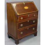An Edwardian inlaid-mahogany small bureau, with fitted interior enclosed by a fall-front above three