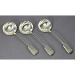 Three Victorian silver Fiddle pattern sauce ladles with oval bowls; London1849, by Charles Lias. (