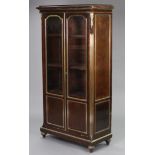 A 19th century French mahogany vitrine, with brass mouldings & gilt metal mounts, enclosed by pair