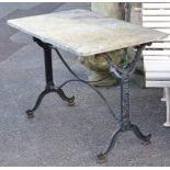 A French cast-iron garden table, with rectangular marble top, on shaped end supports with foliate