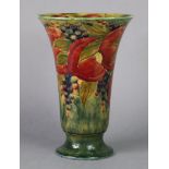 AN EARLY MOORCROFT POTTERY LARGE VASE made for LIBERTY & Co., of flared form, decorated with the
