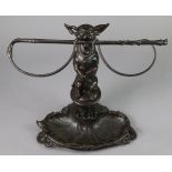 A 19th century COALBROOKDALE NOVELTY CAST IRON STICK STAND in the form of a dog on its hind legs