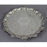 An early George III silver salver with raised shell-&-scroll border, engraved flower & leaf-scroll