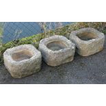 A set of three stone square garden troughs, each 15” wide x 8” high.