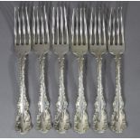 Six American Sterling fancy scroll-edge table forks. (12.5 oz).