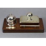 A contemporary silver desk set by Martyn Pugh of Redditch, comprising a cylindrical inkwell with