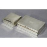 A silver rectangular cigarette box with engine-turned hinged lid, wood-lined interior, 5½” wide,