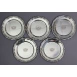A set of five Swedish .800 Standard dinner plates, the raised border with shaped & reeded ribbon-