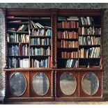 AN EARLY VICOTRIAN ROSEWOOD LIBRARY BOOKCASE, in two sections (originally a pair, now forming
