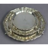 A matched set of silver salver, waiter, & card tray, all with raised & shaped rim & on three short