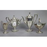An Elkington & Co. Four-piece tea & coffee service of hexagonal vase form, engraved with swags,