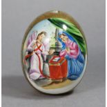 A Russian Imperial Porcelain easter egg painted with an angel appearing before a female figure on an