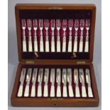 Twelve pairs of Edwardian silver dessert knives & forks with engraved decoration & mother-o’-pearl