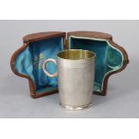 A Victorian silver christening mug of slightly tapered cylindrical shape, the body rim inscribed: “