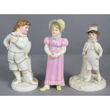 A Royal Worcester porcelain “Kate Greenaway” sugar caster figure of a girl in yellow bonnet & long