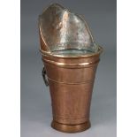 A 19th century large copper coal hod of tapered cylindrical form, with raised back & leather strap
