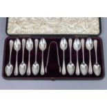 A set of twelve late Victorian silver Hanoverian rat-tail coffee spoons & matching sugar tongs;