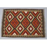A small Maimana kilim rug, of ochre ground with central repeating design & narrow border, 24” wide x