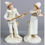 A pair of Royal Worcester porcelain ivory & gilt standing boy & girl musician figures, the faces &