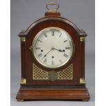 An Edwardian bracket clock in mahogany & brass architectural case with presentation plaque, the