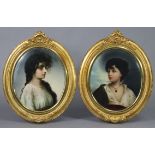 A PAIR OF CONTINENTAL PORCELAIN OVAL PLAQUES, each with portrait of a young lady, one with long