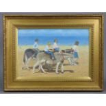 STEVEN JONES (Welsh, 1959-2017). A beach scene with children riding donkeys, figures along the shore