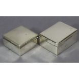 A silver rectangular cigarette box with engraved initials to the hinged lid, wood-lined interior,