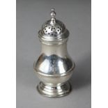 A George II silver baluster pepper pot, the pierced cover with swag decoration & knop finial, on