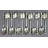 A set of twelve Edwardian silver Queen Anne pattern teaspoons; Sheffield 1908, by Walker & Hall. (