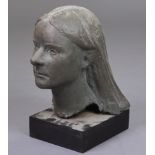 A sculptured earthenware female head, signed “Clark ‘70”, on block base; 15.25” high over-all.