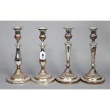 Two pairs of late 18th century Sheffield plate candlesticks, each with slender baluster column on