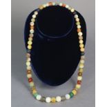 A coloured glass-bead necklace, 27” long.