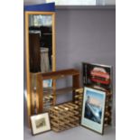 A small four-tier standing open bookcase, 32½” wide x 29” high; together with two wine racks; a