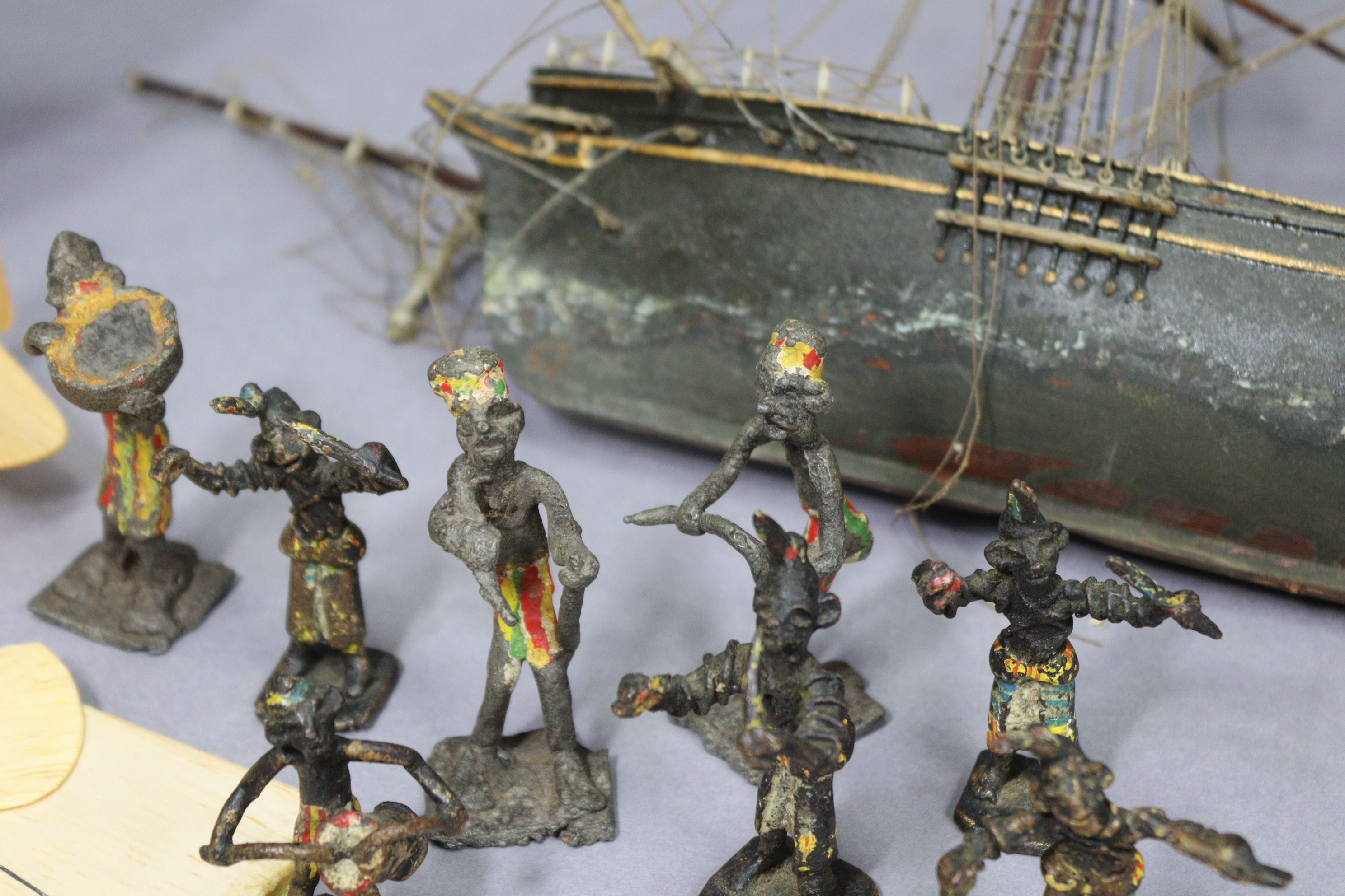 Eight painted lead African bandsmen figures; together with two wooden model ships; & three balsa - Image 4 of 12