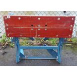 A Black & Decker Workmate; together with a set of six pine garden posts; & two watering cans.