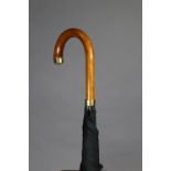 A vintage Dunhill 18ct gold-mounted gent’s umbrella with polished wooden handle; 36.5”.